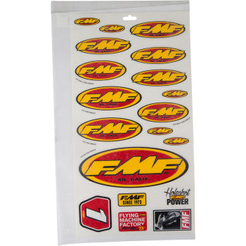 The Assorted Sticker Sheet by FMF features yellow, red, and black oval and rectangular decals with the Flying Machine Factory phrase plus extra small logos.