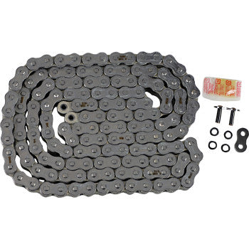The 530 Max X Chain 150 Links Chrome by RK, along with a connector link, O-rings, pins, and a packet of grease, are neatly arranged on a white background, showcasing the chain's coiled, high-tensile metal design.
