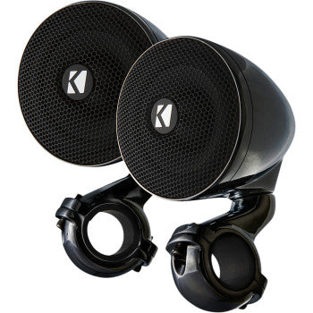 Two black, round Mini Speakers 2 ohm by Kicker with honeycomb grilles, high-efficiency drivers, and mounting brackets for handlebars or similar surfaces; weather-proof design.