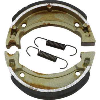 A pair of Brake Shoes by DP Brakes with black friction linings and two coiled springs, arranged on a plain white background, evoke high-tech motorcycle performance and reliability.