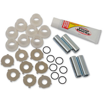 The A-Arm Bearing Kit Front Upper Lower by Pivot Works, ideal for Yamaha, includes bushings, metal washers, O-rings, needle roller bearings, spacers, and assembly lubricant—neatly arranged on a white background.
