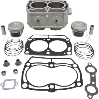 Silver metal Polaris cylinder kit with two pistons, piston rings, gaskets, and small engine hardware components arranged.