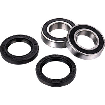 The Axle Bearing Kit Front & Rear by Factory Links includes two metal ball bearings with visible rings and two flat black rubber oil seals, perfect for off-road wheels, displayed on a white background.