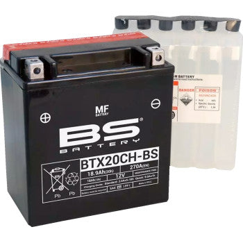 The Battery BTX20CH BS (YTX) by Bs Battery is shown in black with superior power, placed in front of a clear plastic acid pack and white caps. The label displays technical specifications and safety icons.