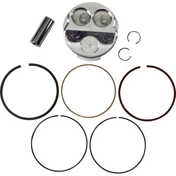 Piston Kit by Je Pistons components laid out on a white background, featuring a forged aluminum piston, wrist pin, two circlips, oil ring, and multiple piston rings arranged in a circle.