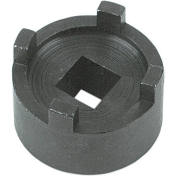 The Tool Spanner by Dennis Stubblefield Sales is a black metal socket with four rectangular rim notches and a center square hole, perfect for removing oil filter or engine mount castle nuts using a wrench or ratchet.