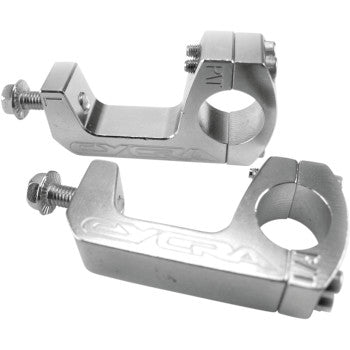 The Probend™ Handguard Hardware U Clamp Pro Taper by Cycra includes two silver CNC-machined billet aluminum handlebar mounts with bolts, each engraved with the Cycra logo—ideal replacement parts for securing handguards on your bike or motorcycle.