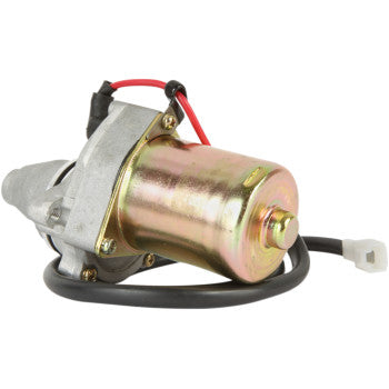 The Starter Motor by Parts Unlimited features a metallic cylindrical casing, copper bushings, attached wires, and a plastic connector plug, shown on a white background.