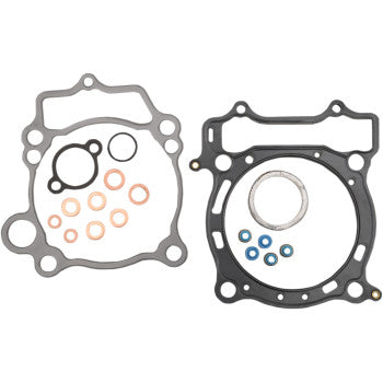 Gray and black motorcycle engine gasket set with copper and blue sealing rings, various shapes and sizes.