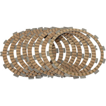 A stack of Prox Clutch Friction Plates, featuring alternating metal and friction material segments, is arranged overlapping on a white background for maximum performance.