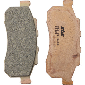 Sintered metal brake pads with textured friction surface and copper-toned backing plates for off-road use.