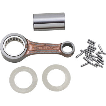 Copper-colored metal connecting rod kit with silver cylindrical pin, needle bearings, and two white washers.