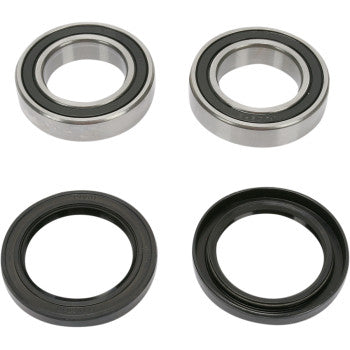 The Yamaha Warrior Wheel Bearing Kit Rear by Pivot Works includes two double-sealed ball bearings and two black rubber seals, arranged in a grid on a plain background to help restore your steering control.