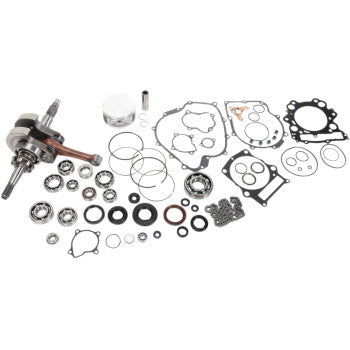 Complete Yamaha Grizzly Rhino 660F engine rebuild kit with metal crankshaft, pistons, gaskets, seals, and bearings laid out.