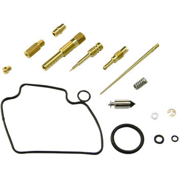 Brass carburetor parts, black rubber gaskets, spring, and small metal washers for Honda repair kit.