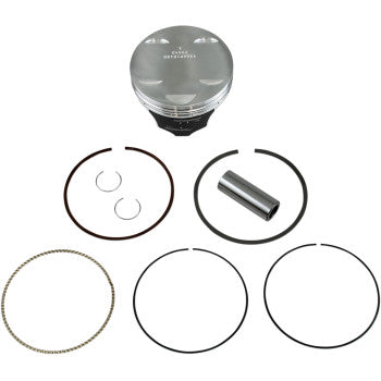 The Yamaha Piston Kit 101.00 mm by Wiseco includes a forged piston, two circlips, a piston pin, and four piston rings arranged on a white background—ideal for enhancing engine performance.