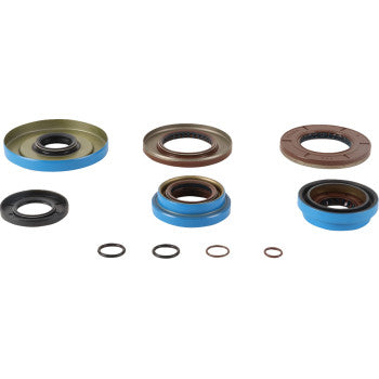 The Polaris Transaxle Seal Kit by Moose Offroad includes six circular oil seals and four small O-rings in assorted sizes, arranged in two rows on a white background—ideal for efficient oil leak repair.
