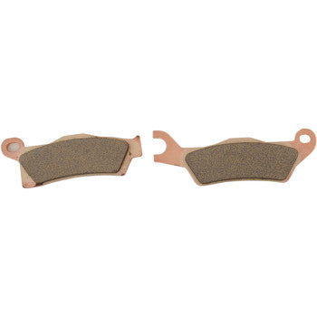 Copper-colored metal sintered brake pads with textured friction surfaces for off-road Can Am Outlander.