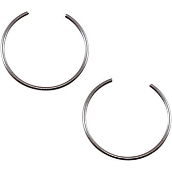 Two silver Circlip by Wiseco are shown on a white background. Each forms nearly a full circle with a small gap, resembling typical Wiseco circlips in both size and shape.