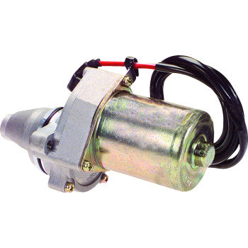 The Starter LT80 KFX80 by Psykho is a metallic, cylindrical OEM replacement electric motor with attached wiring and a mounting bracket—featuring new, not remanufactured, starters for automotive or industrial use.