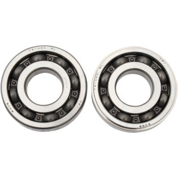 Two Yamaha Crankshaft Bearings by Hot Rods, featuring black inner balls, are displayed side by side on a white background—perfect for main bearing replacement in crankshaft assemblies.