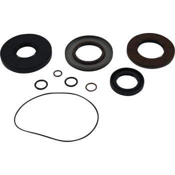 The Polaris Transaxle Seal Kit by Moose Offroad includes assorted rubber and metal seals, large gaskets, small rings, and an elongated O-ring—ideal for oil leak repairs and perfect as a comprehensive seal kit. Displayed on a white background.