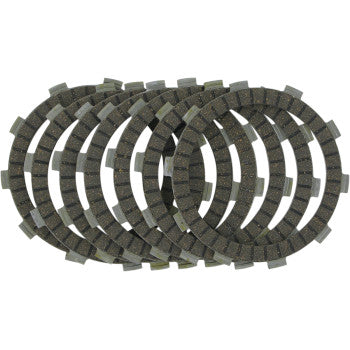 The Clutch Kit by Ebc includes seven dark, circular friction plates with notched edges and textured surfaces, arranged overlapping on a white background. These durable plates ensure enhanced wear resistance for reliable clutch performance.