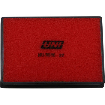The Polaris Air Filter by Uni Filter is a rectangular red foam filter with a black border and black UNI logo, model NU-8516 ST, featuring an Ultra Seal grease groove for superior engine protection.