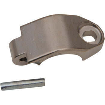 The Hinge Clamp Lower Hydraulic Clutch by Magura is a metallic, curved part with a hole at one end and a side notch, shown next to a small metal pin—ideal as a KTM hydraulic clutch replacement.