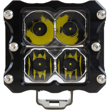 Close-up of the LED Quattro Light Spot Flood by Heretic, featuring four circular CREE LEDs in a square black and silver aircraft-grade aluminum casing with visible corner screws.