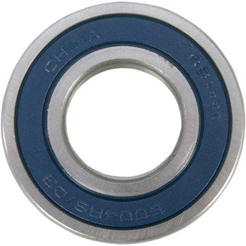 The Single Bearing 20 x 42 x 12 by Parts Unlimited is a circular metal ball bearing with a blue seal on one side and engraved text on the outer edge, showcasing top-quality craftsmanship.
