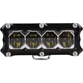 A close-up of the LED Light Bar 4" Flood by Heretic, a 24 W rectangular LED with four yellow and black reflector sections, rugged black metal frame, silver corner bolts, and durable stainless steel mounts.