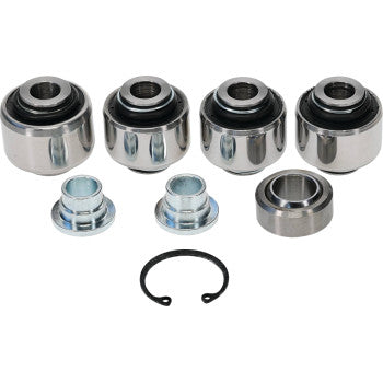 The Suspension Kit Rear Independent by Moose Offroad features metal bushings, spacers, and a snap ring arranged on a white background—perfect for A-arm or rear suspension repair. Four larger bushings are positioned at the back, and all parts vary in size and shape.