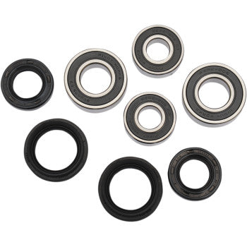 The Kawasaki - Kymco Wheel Bearing Kit Front by Pivot Works includes four double-sealed ball bearings with metal rings and three black rubber oil seals, ideal for wheel bearings and enhanced steering control. Displayed on a white background.