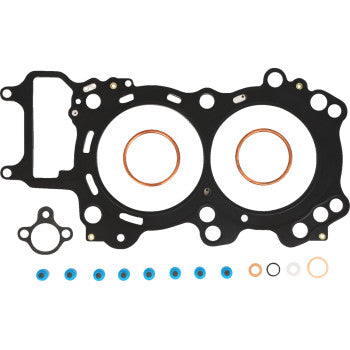 The Honda Top End Gasket Kit by Cometic features MLS head gaskets with Extreme Sealing Technology, a large black gasket with two copper rings, a smaller black gasket, and multiple small round blue, white, copper, and black seals.