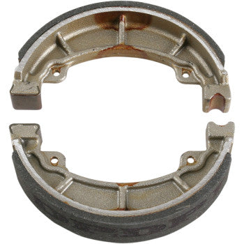 The Polaris - Kymco Brake Shoes by Dp Brakes feature two metallic, curved sintered brake pads with a textured friction material on one side and minor rust spots visible on the metal surface.