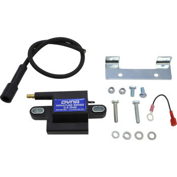 The Yamaha Coil Kit by Dynatek includes a DYNA MINIATURE SERIES ignition coil, black cable, spark plug wires, mounting bracket, screws, washers, and nuts. All parts are neatly arranged on a white background.