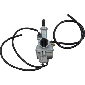 Silver metal Kawasaki replacement carburetor with black rubber hoses attached, designed for offroad use.