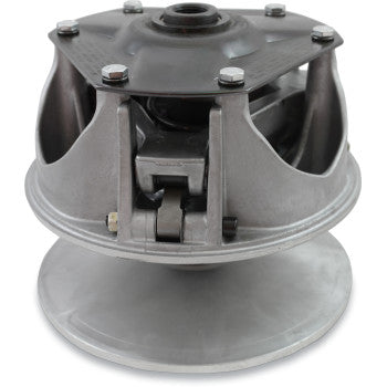 A close-up view of a metal mechanical component, likely the Kawasaki 103 HPQ Clutch by Comet, featuring bolts, a pulley, and sturdy structural elements—engineered for peak quad performance.