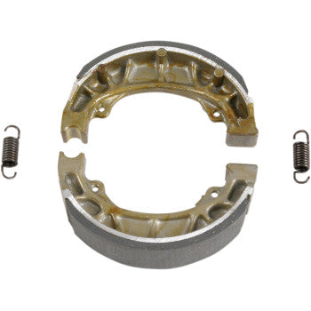 Brake Shoes by Ebc: This pair of die-cast aluminum brake shoes with bonded linings and original-style springs is arranged in a circle on a plain white background.