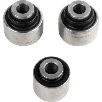 Three metal bushings from the Suspension Kit Rear Independent Knuckle Only by Moose Offroad, featuring central holes and black inner rings, are arranged in a triangle on a white background.
