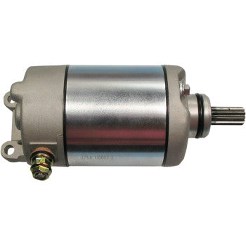 Silver cylindrical Polaris starter motor with gray housing, mounting points, and gear shaft on right end.