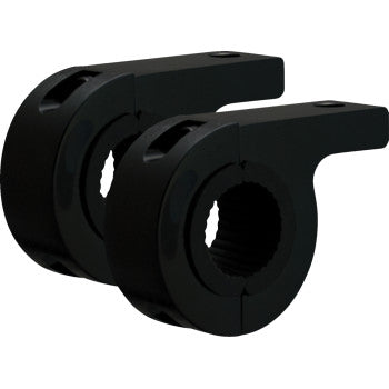 A pair of Vision X Clamp Mount 1 brackets, black metal with circular openings and extended flat arms for mounting, are displayed side by side against a white background.