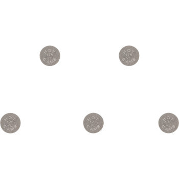 Five circular metallic valve shims with engraved sizing and branding details on a white background.