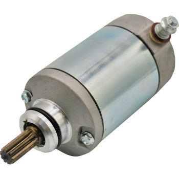 Silver cylindrical Suzuki starter motor with metal casing and gear teeth on one end.