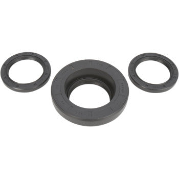 Three black circular seals of varying sizes from the Honda Differential Seal Kit Rear by Moose Offroad are displayed on a white background, with the largest seal in the center and two smaller ones on each side. Perfect for differential servicing.