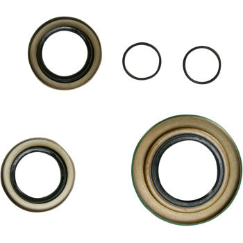 The Can Am Differential Seal Kit Rear by Moose Offroad features four circular mechanical seals—including TC rubber seals with metallic outer rings and solid black rubber rings—arranged on a white background, perfect for your differential service needs.