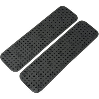 Two rectangular Traction Pad All Purpose Strips Black by Stompgrip, with rounded corners and raised dot patterns, are shown side by side on a white background, delivering excellent under-foot traction.