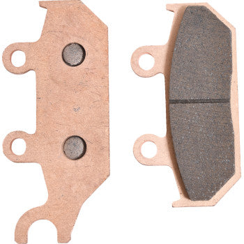 The image shows Sintered Brake Pads by All Balls: the left pad reveals a backing plate with three holes, and the right pad presents the friction surface with a central groove—delivering excellent stopping power and durability.