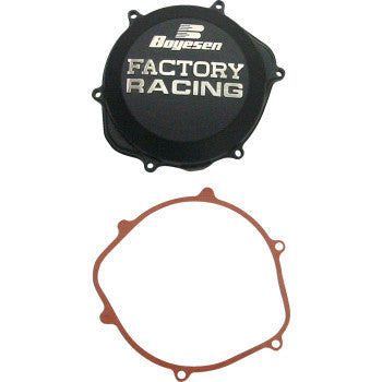The Honda Clutch Cover Black by Boyesen, a lightweight factory racing clutch cover with a powder-coated finish, and a brown gasket are displayed against a white background.